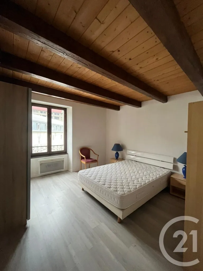 Chambres - Appartement T2 avec Poutre Apparente à Morez