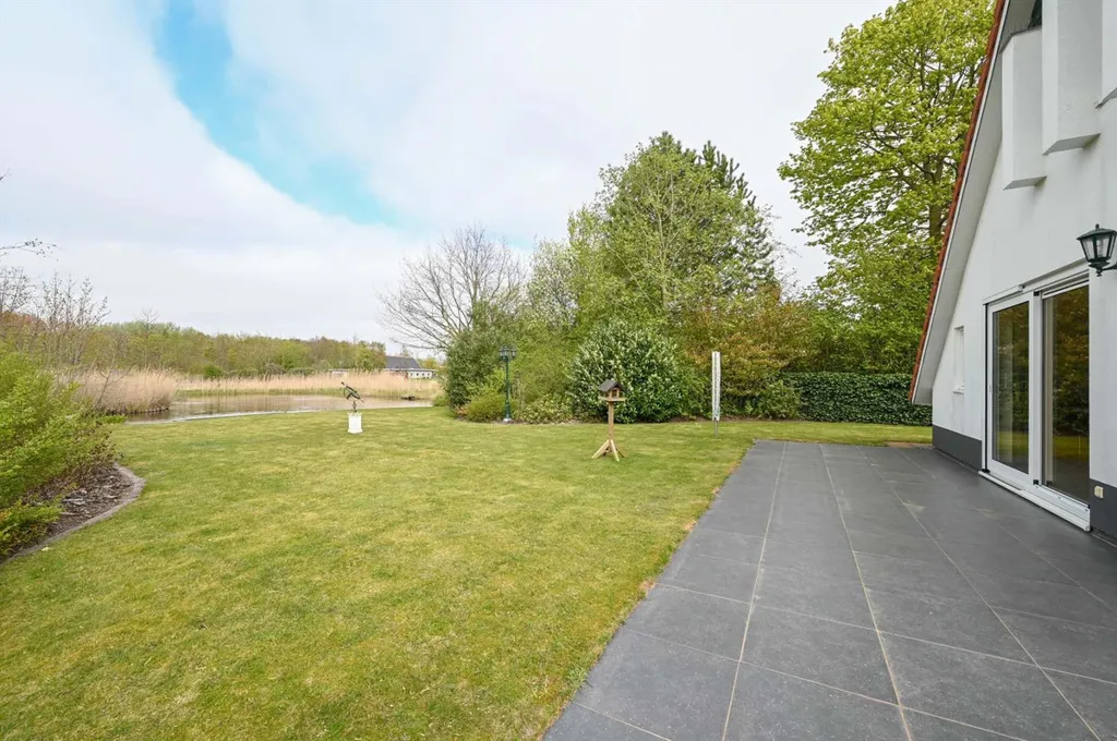 Aed - Waterfront Bungalow with Free View in Lauwersoog