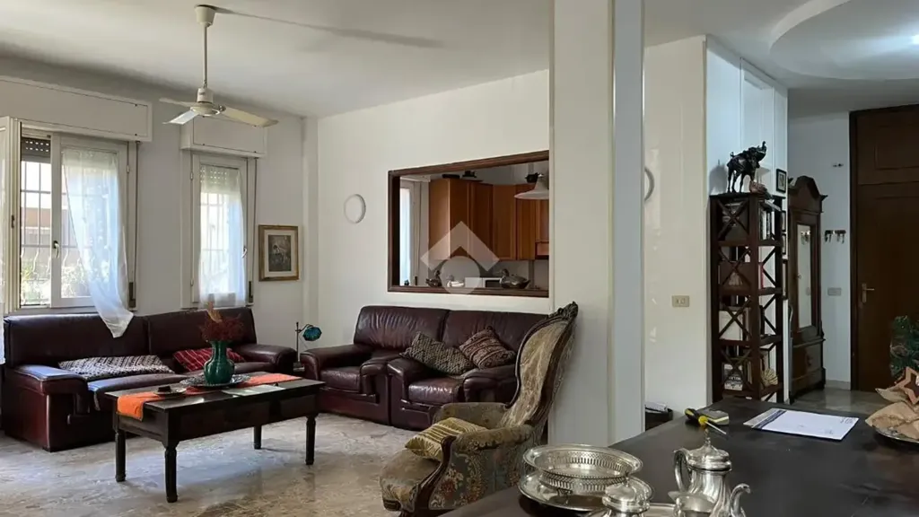Living Room - Three-Bedroom Apartment with Balcony in Melegnano