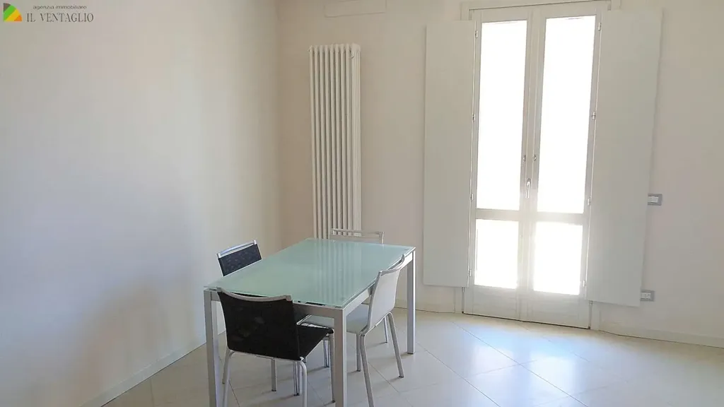 Dining Room - Rustic-Style Flat with Balcony in Sassuolo