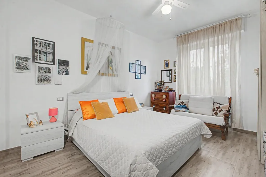 Bedrooms - Rear-Accessed Apartment with Parking in Milan