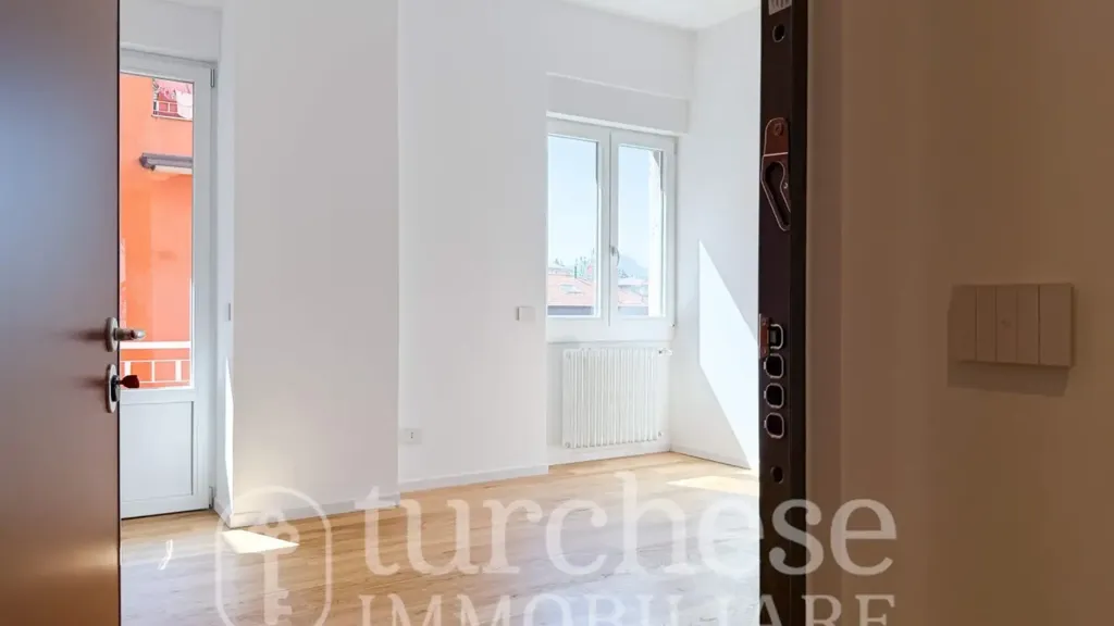 Hallway - Modernised Two-Bedroom Apartment in Bergamo