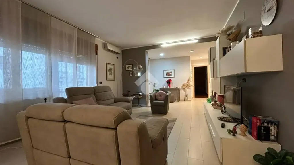 Soggiorno - South-Facing Apartment with Balcony in Cosenza