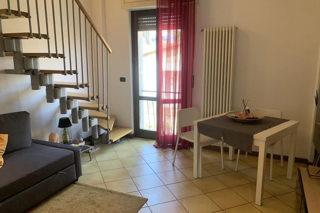 Living Room - Duplex Apartment with Balcony in Monza
