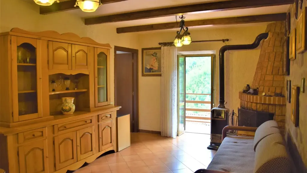 Esik - Rustic House with Terraced Garden in Comano
