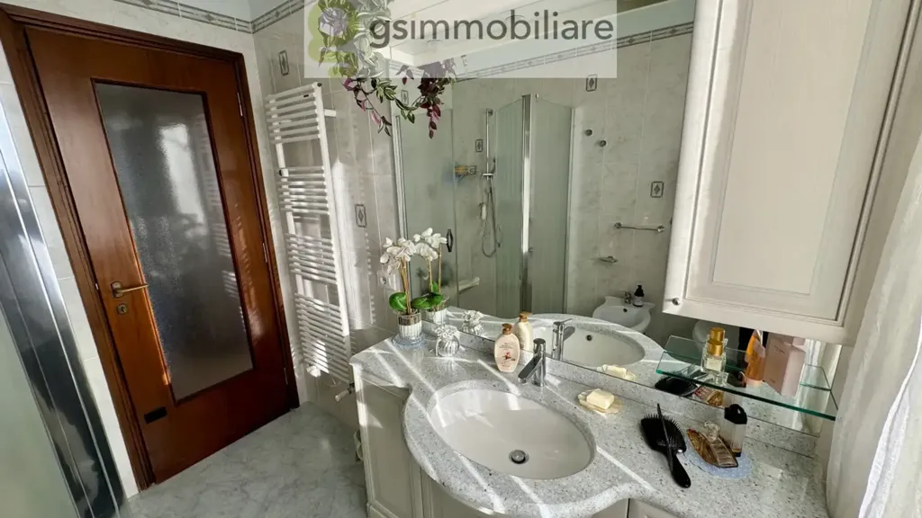 Bathrooms - Spacious Penthouse with Triple Exposure in Brescia