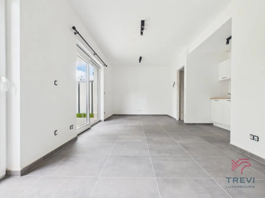 Séjour - Studio Neuf avec Jardin à Arlon
