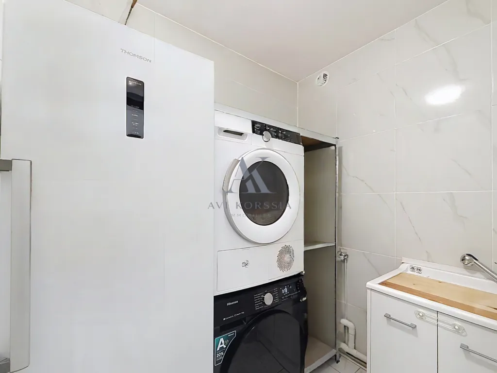 Utility Room - Modern Flat with Balcony in Décines-Charpieu