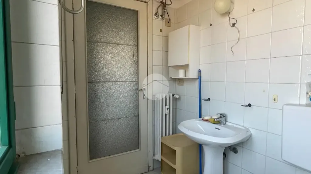 Bagni - Triplex with Balcony in Asti's Historic Centre