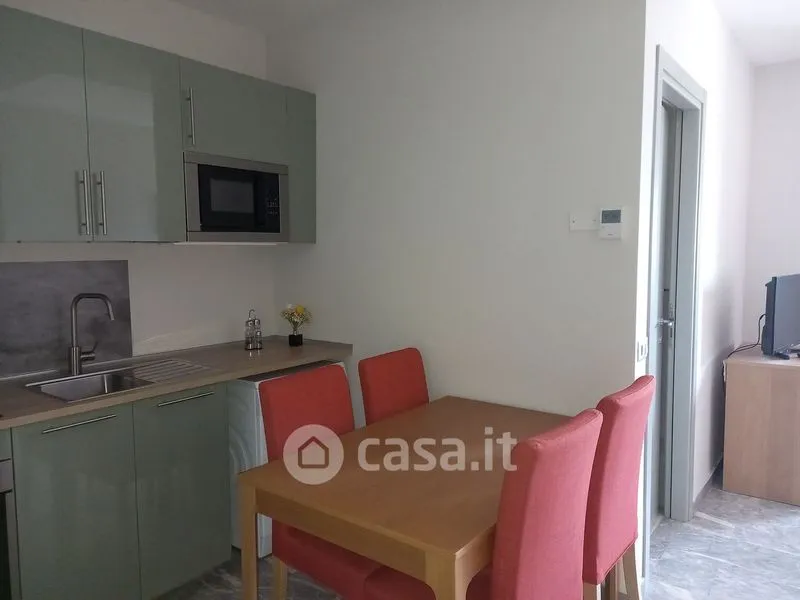 Salle à manger - Modern Studio with Balcony in Piacenza