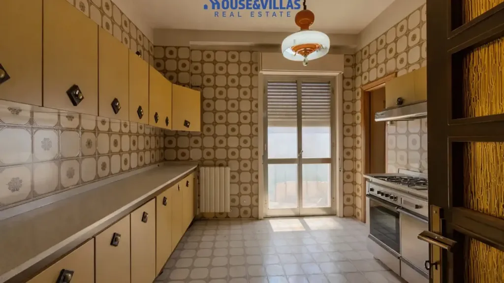 Köök - Three-Bedroom Apartment with Balcony in Avola