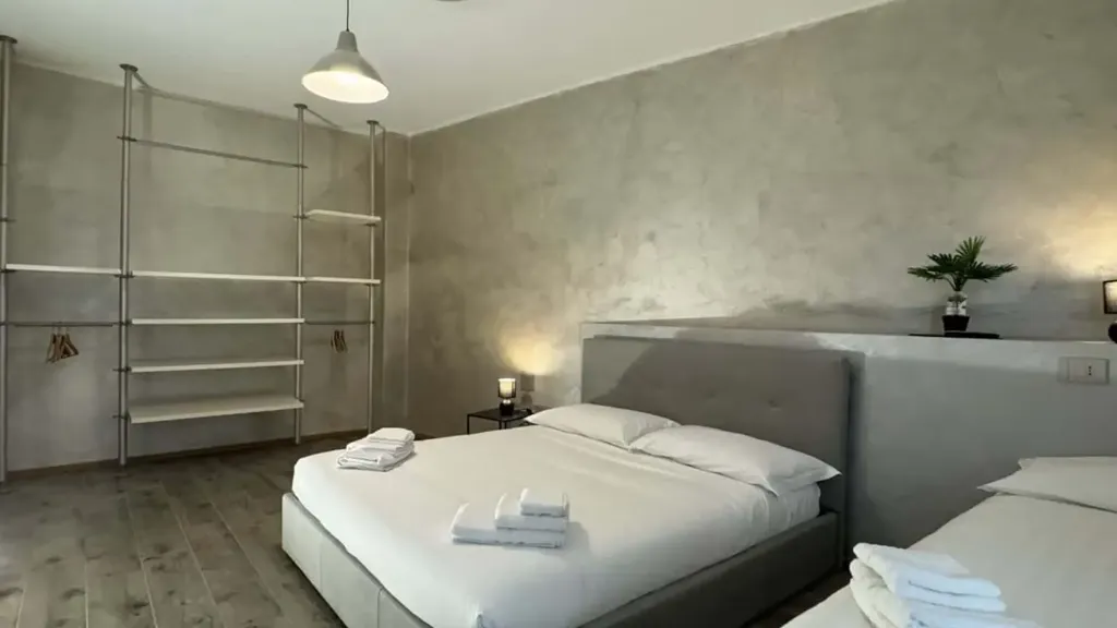 Bedrooms - 1-Bedroom Apartment with Private Parking in Basiglio