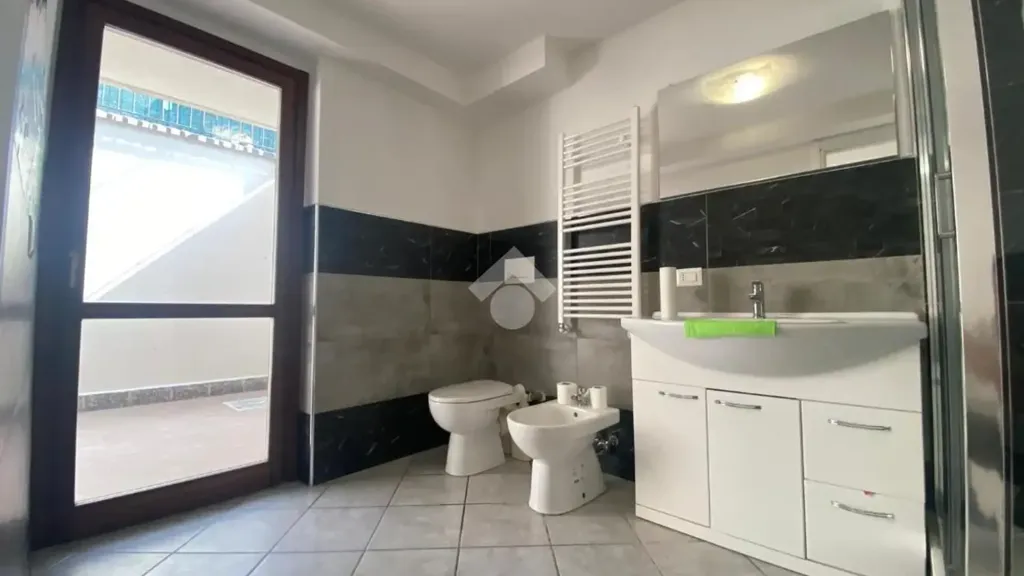 Bathrooms - Bright 2-Bedroom Apartment with Balcony in Corbetta