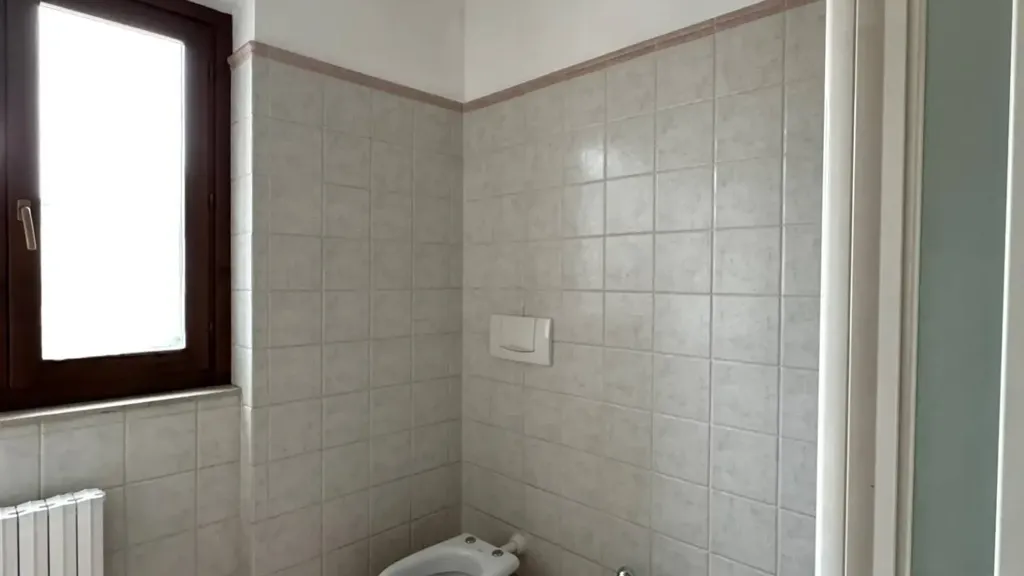 Bathrooms - Modernised Apartment with Balcony in Fermo