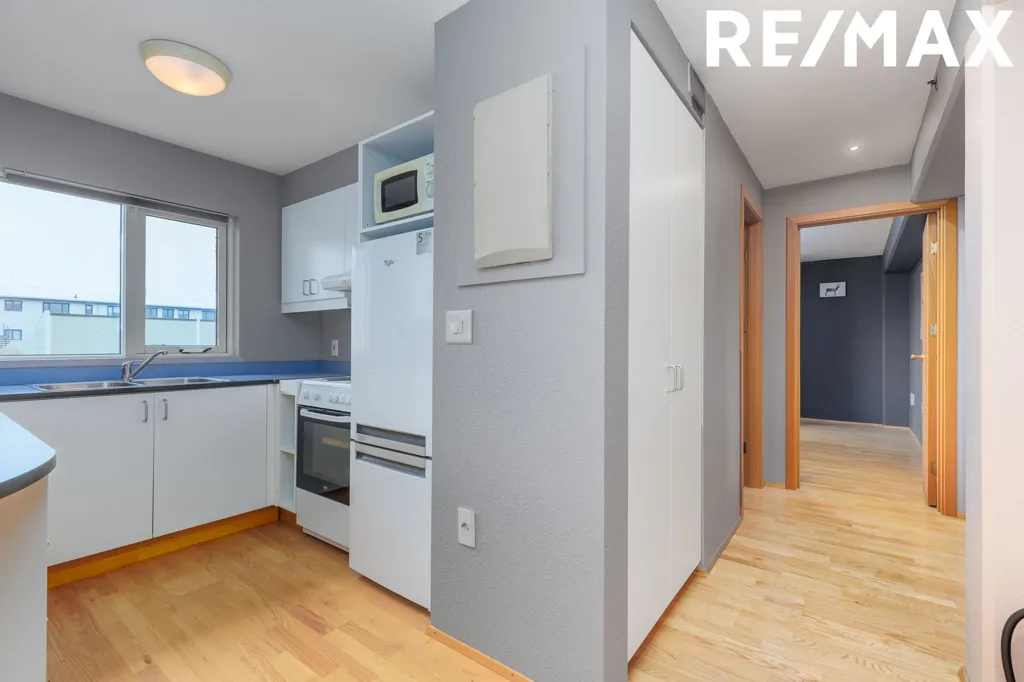 Cuisine - Two-Bedroom Apartment with Balcony in Reykjanesbær