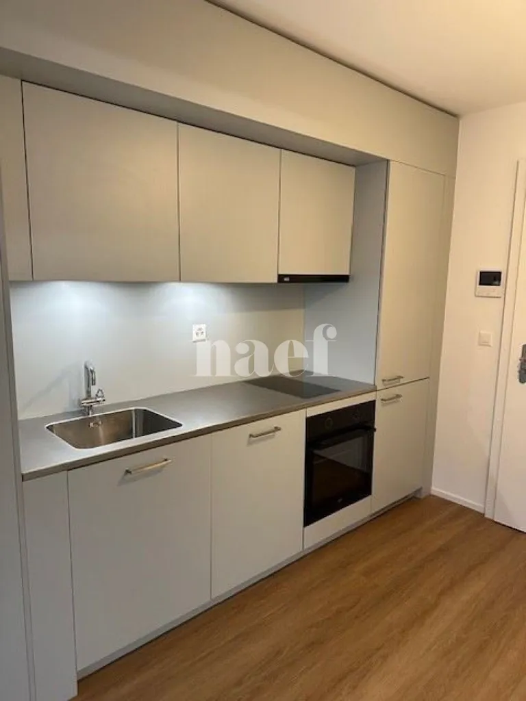 Kitchen - Modern Studio with Balcony in Prilly