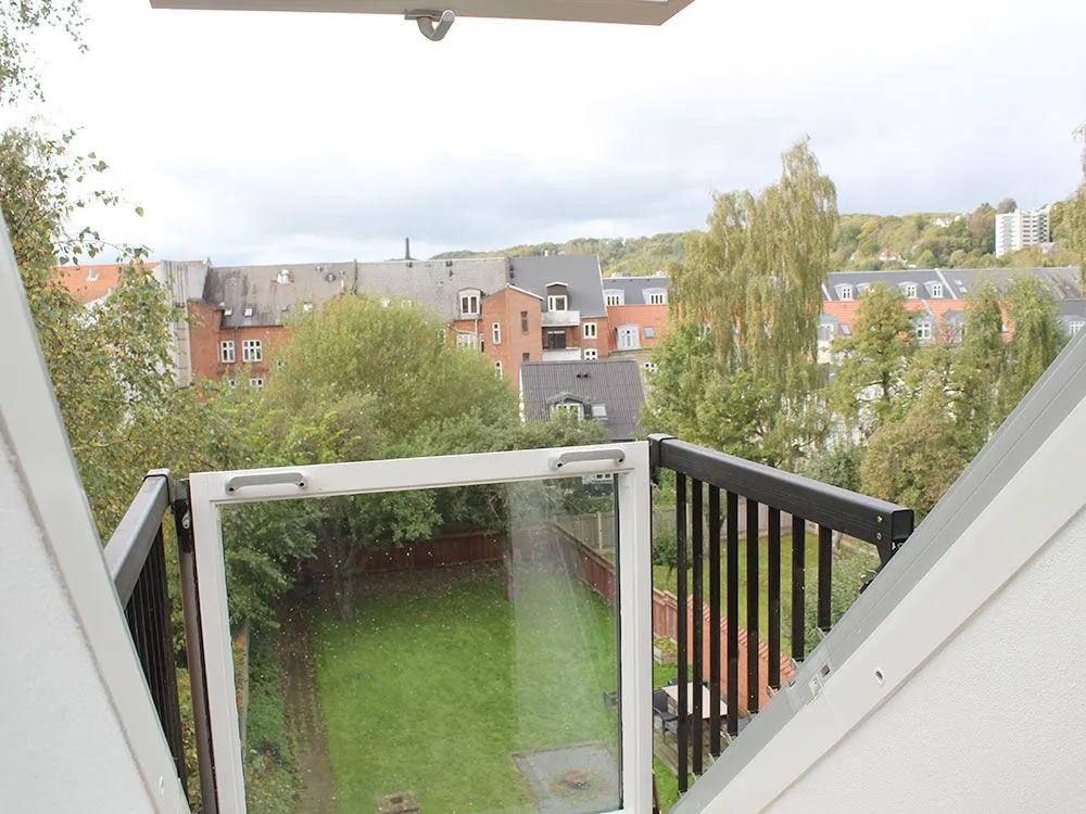 Rõdu - Loft Apartment with Exposed Beams in Vejle