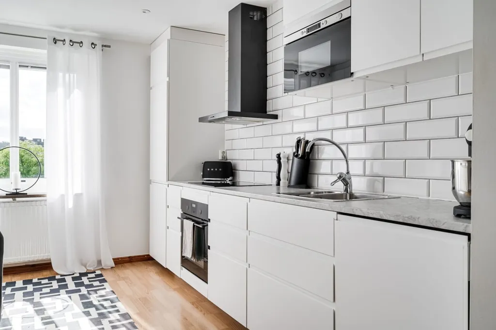 Köök - Modern Flat with Social Spaces near Nature in Stockholm