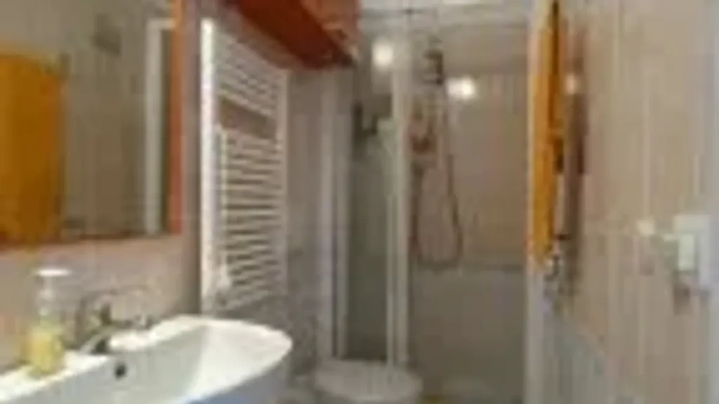 Salles de bain - Spacious Apartment with Terrace in Milano Marittima