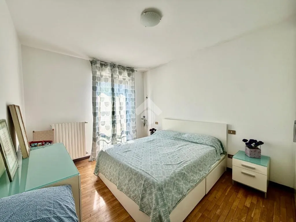 Camere da letto - Three-bedroom Apartment with Balcony in Brescia