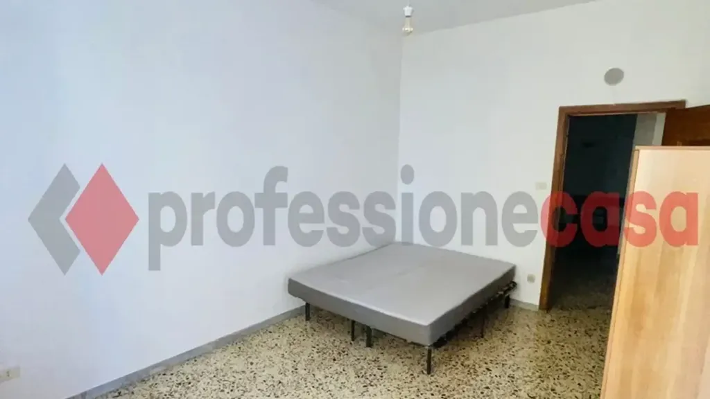 Chambres - Four-Bedroom Apartment in Salerno
