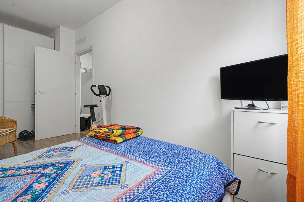 Bedrooms - Rear-Accessed Apartment with Parking in Milan