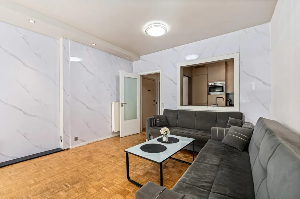 Living Room - Central Apartment with Private Parking in Beveren