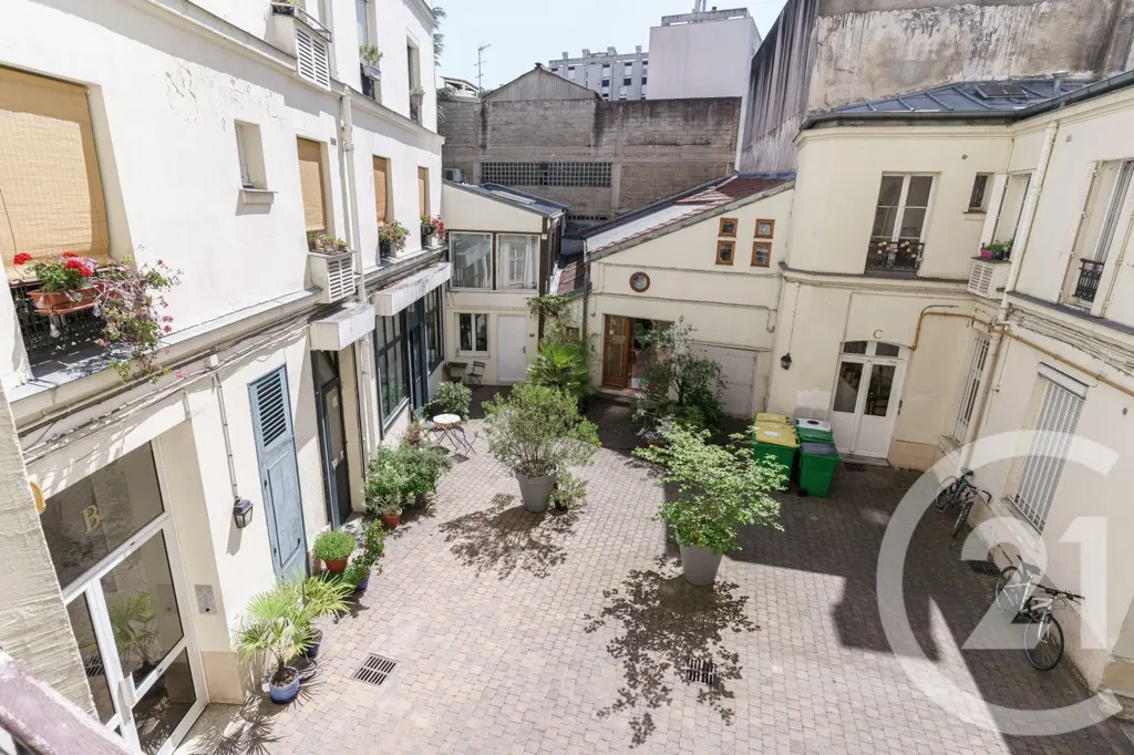 Jardin - Appartement Familial avec Moulures à Paris 19ème
