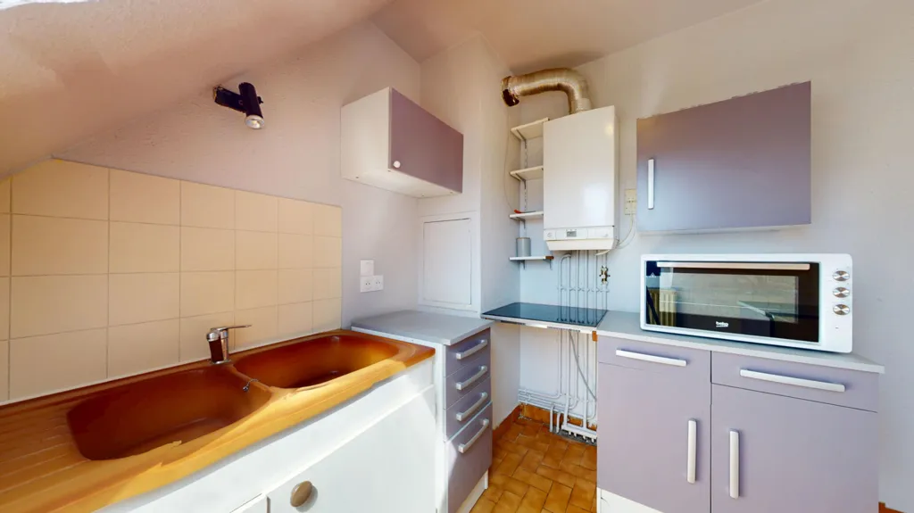 Cuisine - Appartement Duplex avec Cuisine Équipée près du Centre-ville