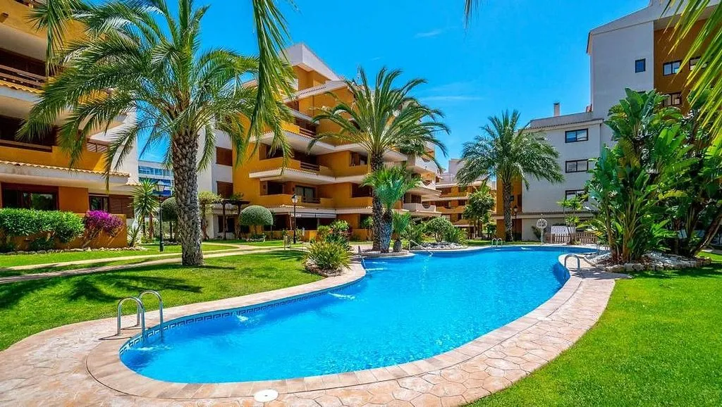 Piscina - Modern Apartment with Pool in Punta Prima