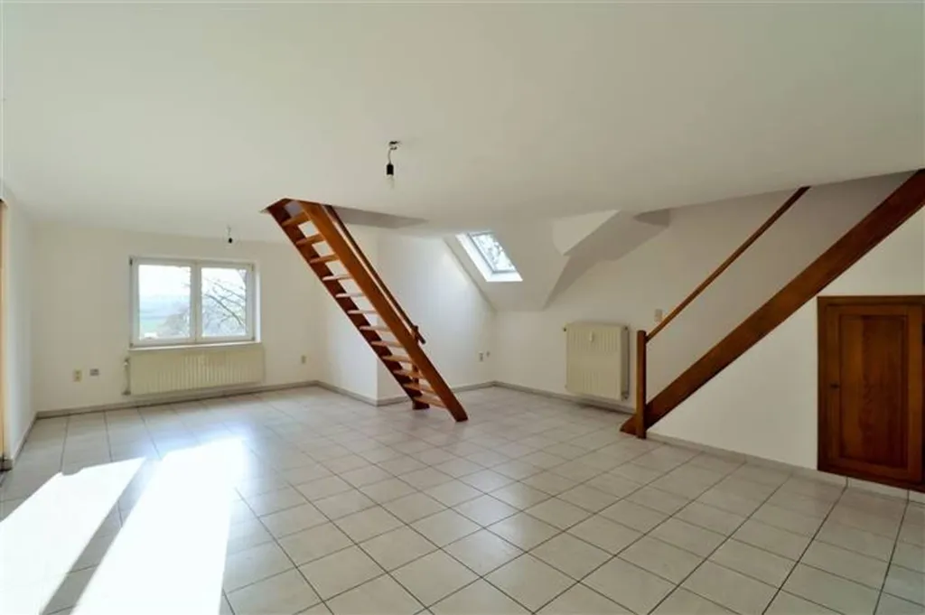 Pièces - Duplex avec Jardin Commun au Centre de Saint-Gérard