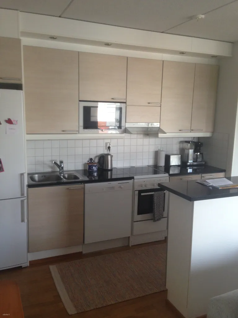 Kitchen - Bright Penthouse with Sauna in Oulu