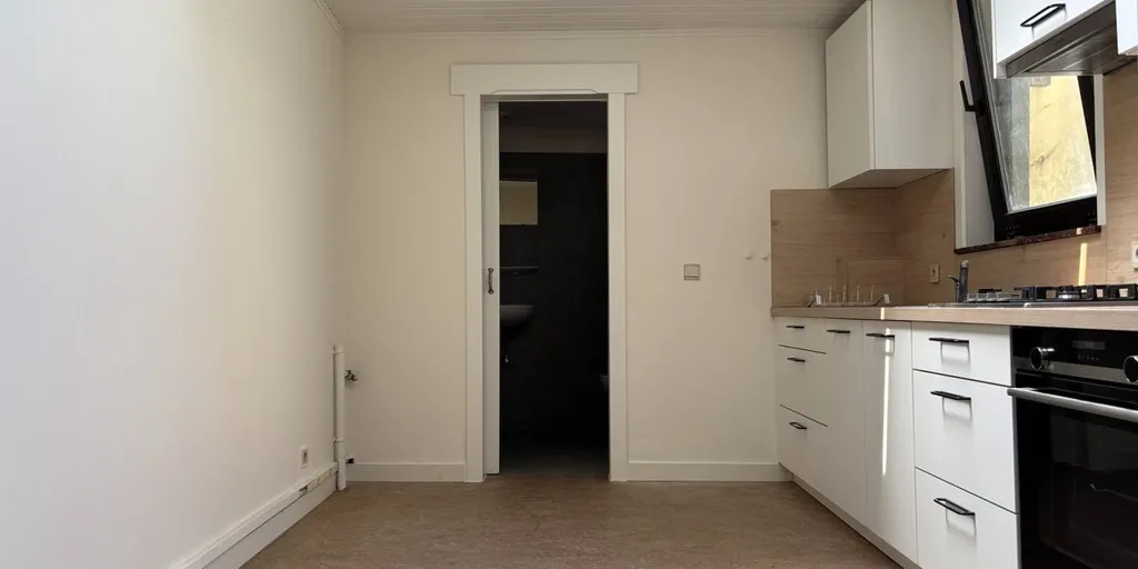 Cuisine - Appartement Gelijkvloers avec Salle de Bains dans le Centre de Louvain