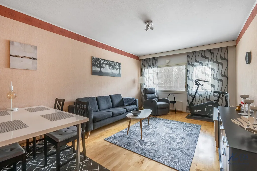 Living Room - Two-Bedroom Flat with Garden View in Runosmäki