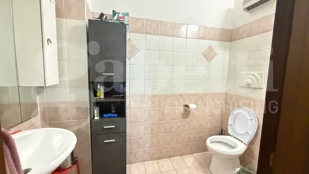 Salles de bain - Three-Bedroom Apartment in Marcianise