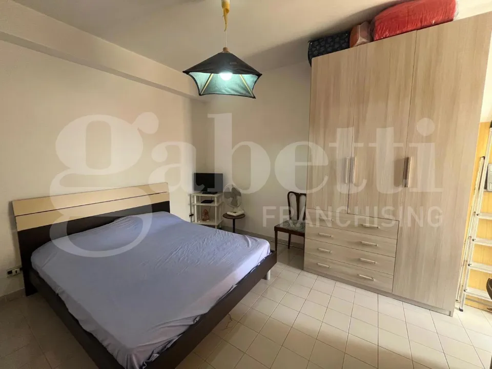 Chambres - 3-Bedroom Apartment with Balcony in Scalea