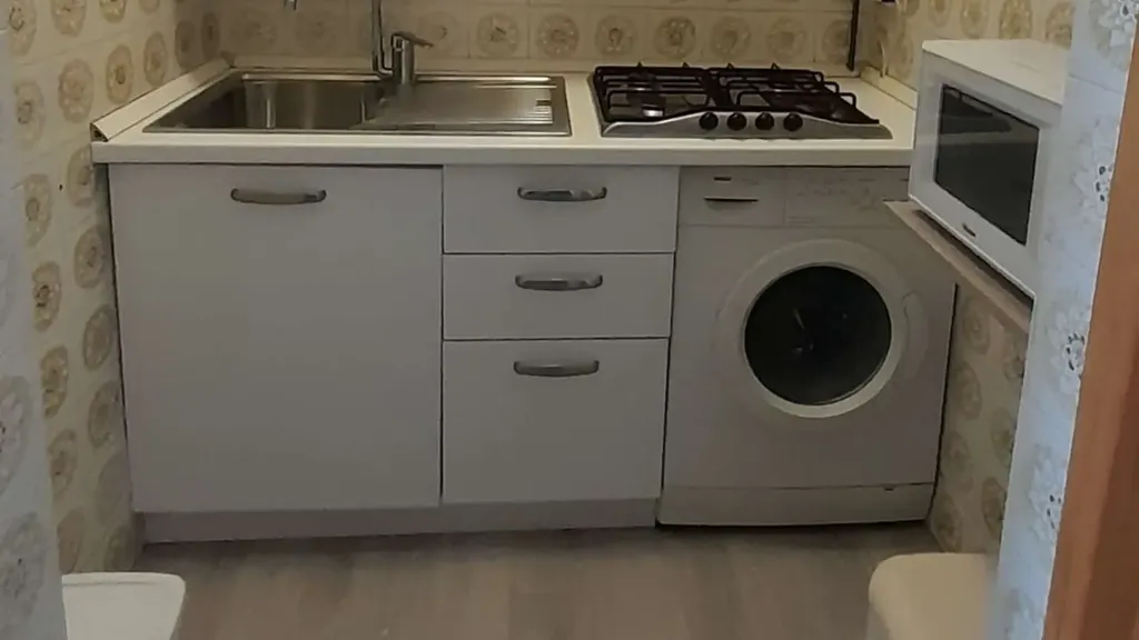Cuisine - Spacious 3-Bedroom Apartment in Jesolo