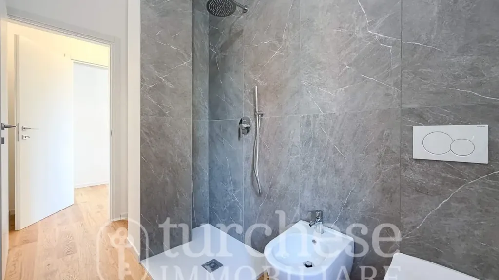 Bathrooms - Modernised Two-Bedroom Apartment in Bergamo