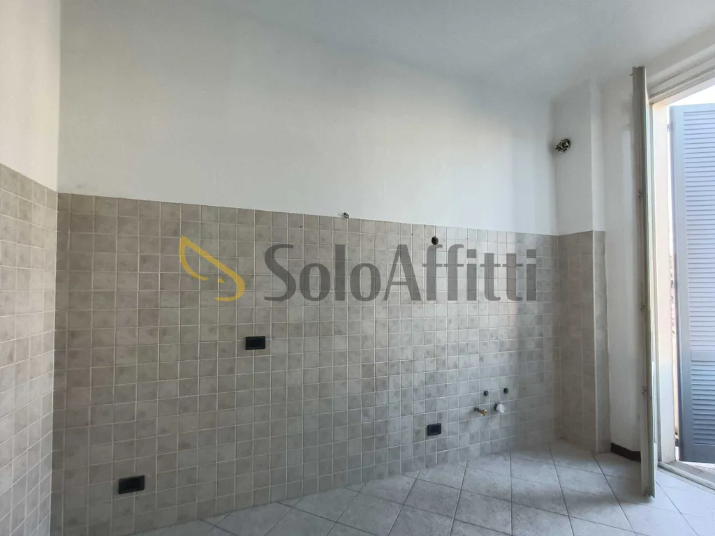 Bathrooms - Three-Bedroom Flat with Balcony in Central Location