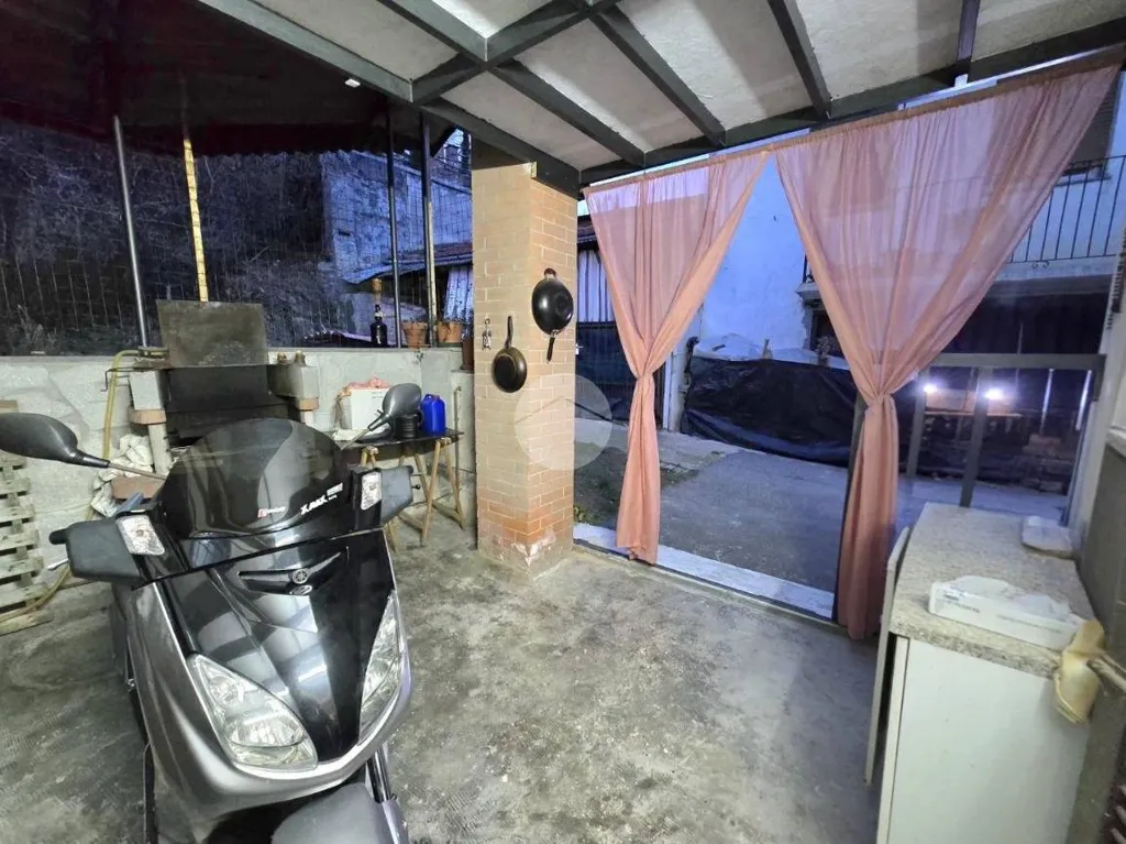 Garage - Rustic House with Covered Patio in Rivarossa