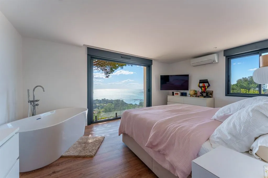Chambres - Appartement Contemporain avec Vue Mer à l'Ouest