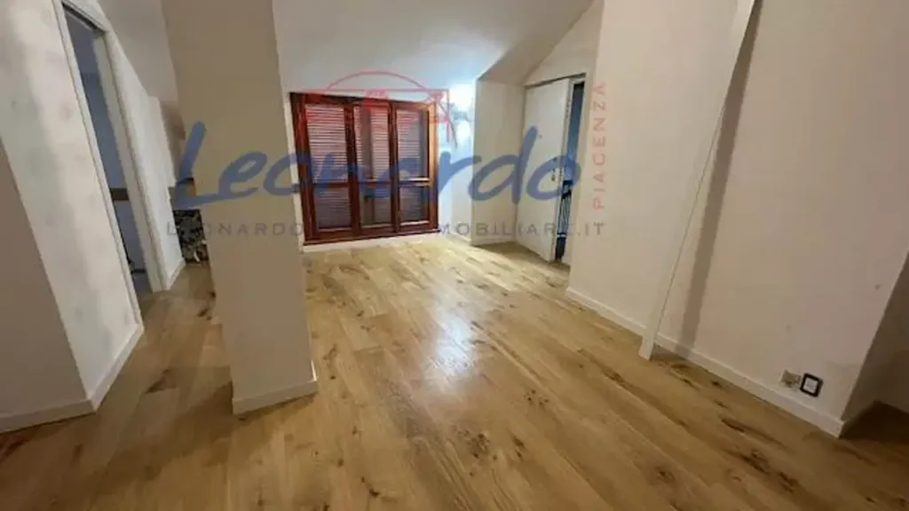 Séjour - Modernised Apartment with Garden View in Piacenza