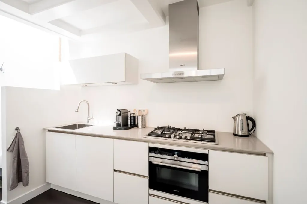 Kitchen - Renovated Apartment with Garden View in Amsterdam