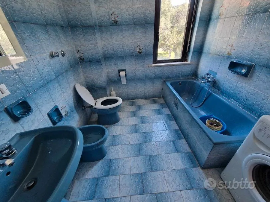 Bathrooms - Two-Level Villa with Courtyard in Stinò