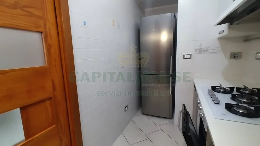 Köök - Armed Two-Bedroom Flat with Balcony in Capua