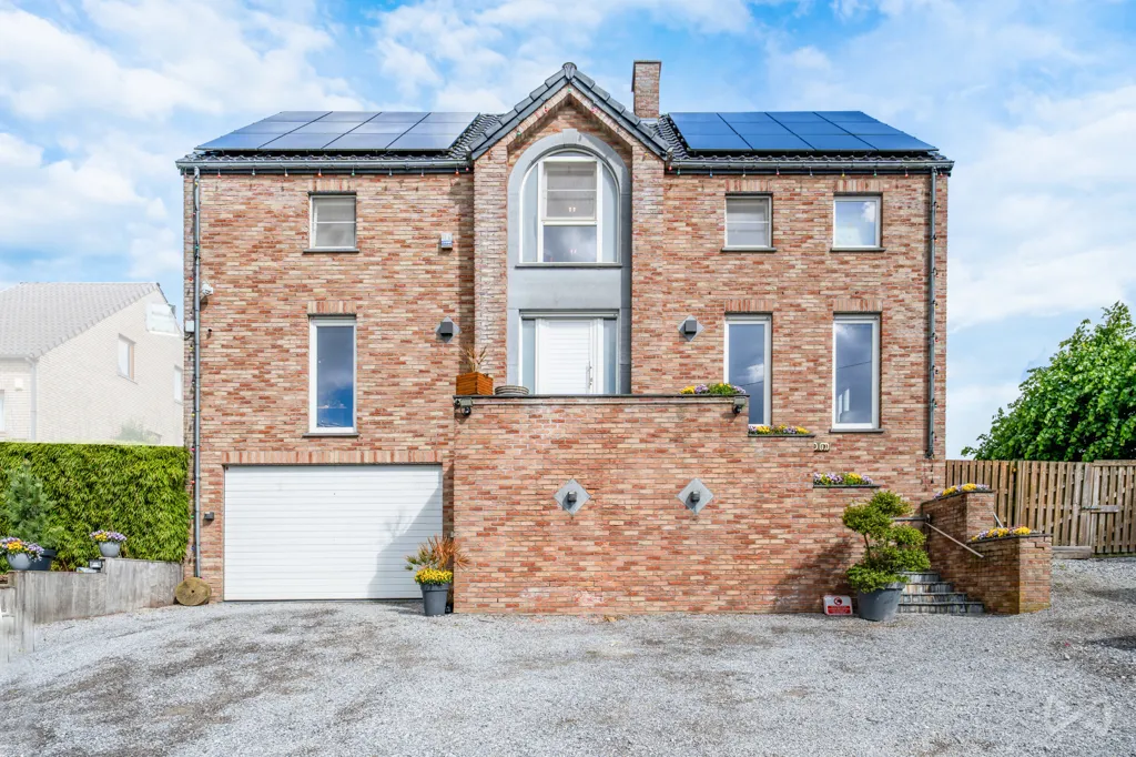 Exterior - House with Photovoltaic Panels in Courcelles