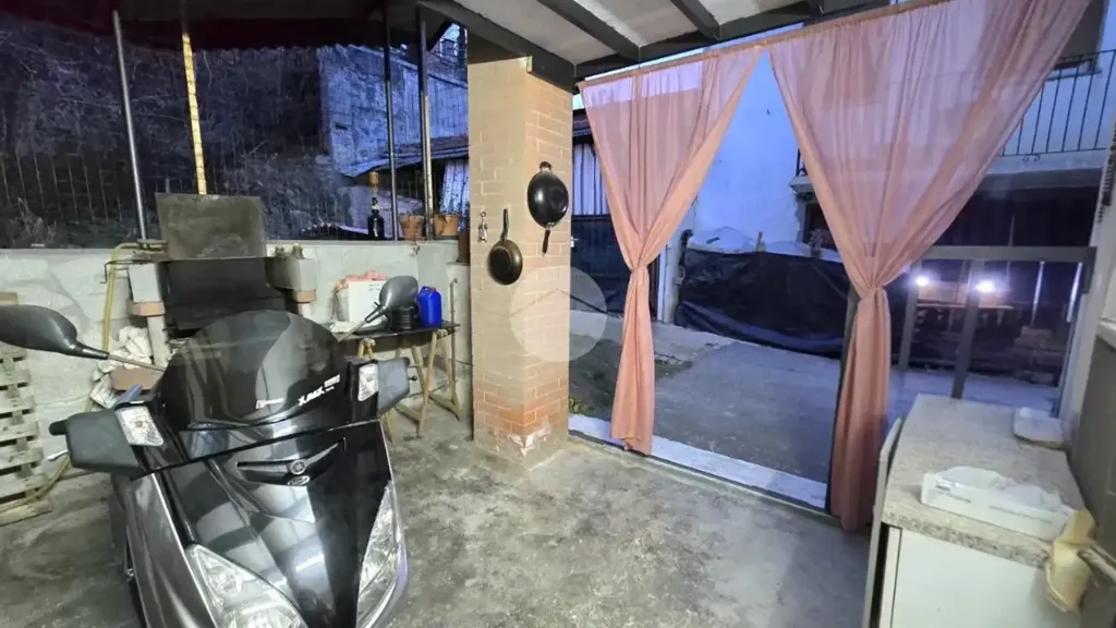 Garage - Rustic House with Covered Patio in Rivarossa