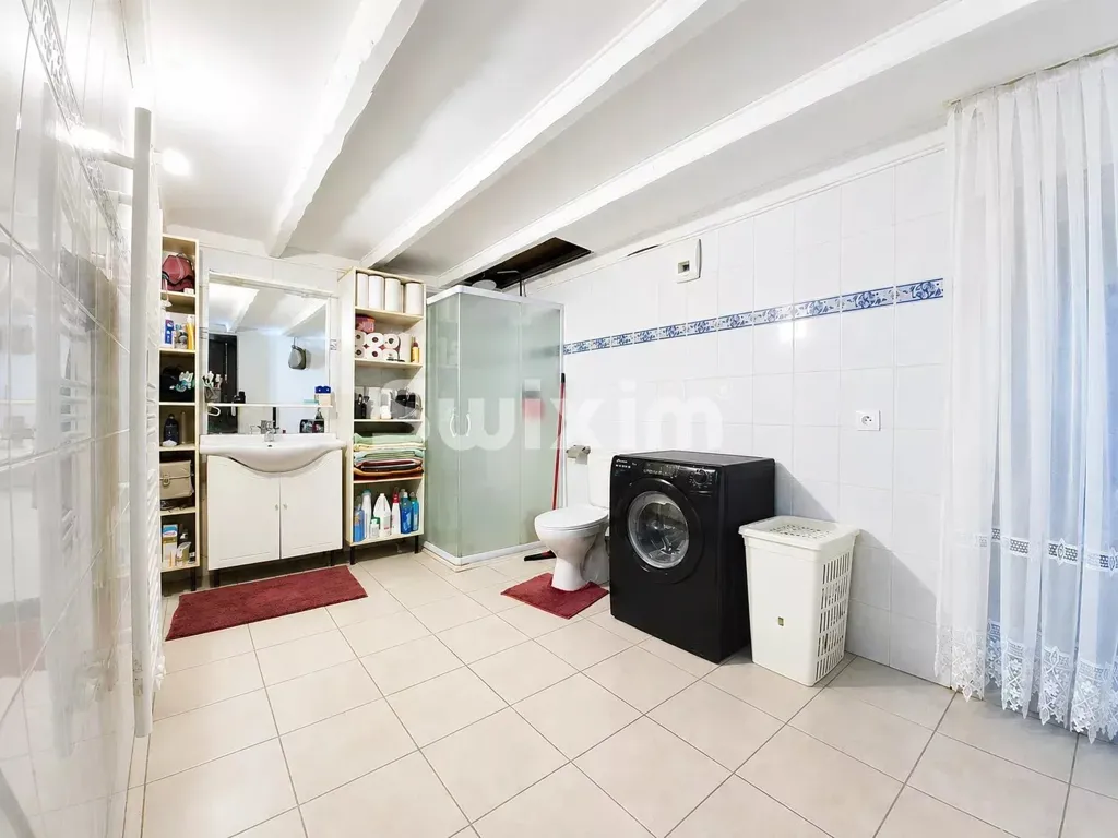Utility Room - Mixed-Use Building with Apartments in Valserhône