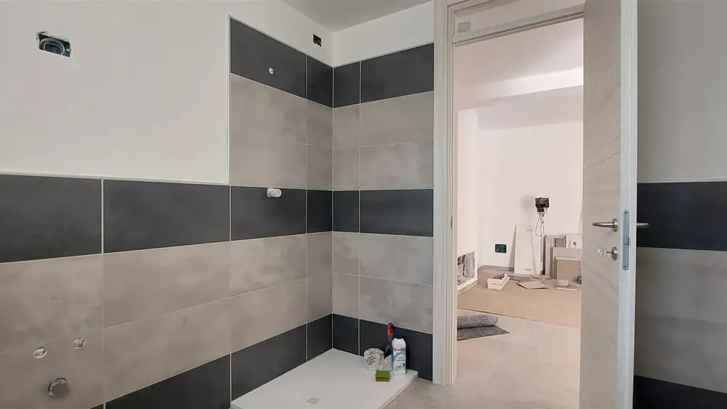 Bathrooms - Two-Level Apartment with Solar Features in Massa Lombarda