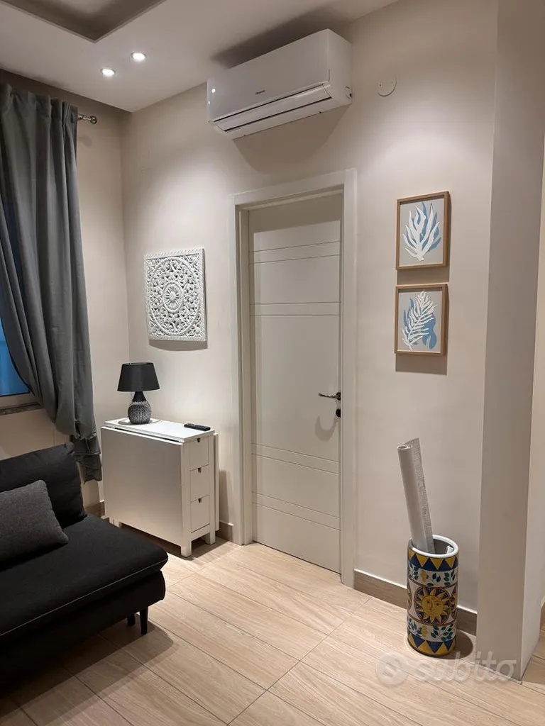 Séjour - Modernised Studio Apartment with Balcony in Aversa Sud